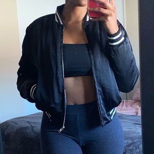 Black and green bomber jackets